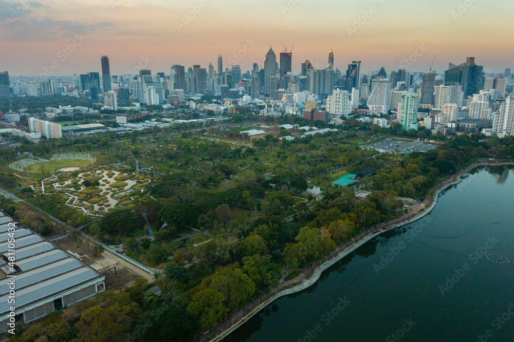 Fototapeta premium Aerial view of Bangkok city night view at Benjakitti Park, Bangkok, Thailand 