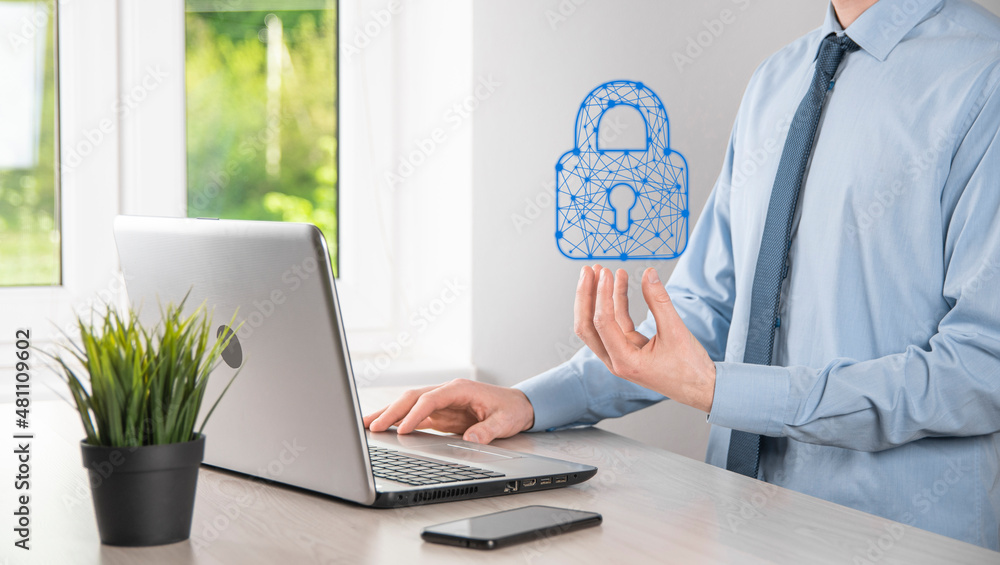 Male hand holding a lock padlock icon.Cyber security network. Internet technology networking.Protecting data personal information on tablet. Data protection privacy concept. GDPR. EU.Banner Male hand holding a lock padlock icon.Cyber security network. Internet technology networking.Protecting data personal information on tablet. Data protection privacy concept. GDPR. EU.Banner