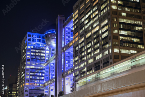 Night shot of Fuji Television Headquarters Building and moving Yurikamome Train in Odaiba, Tokyo 東京・お台場のフジテレビ社屋とゆりかもめ 夜景