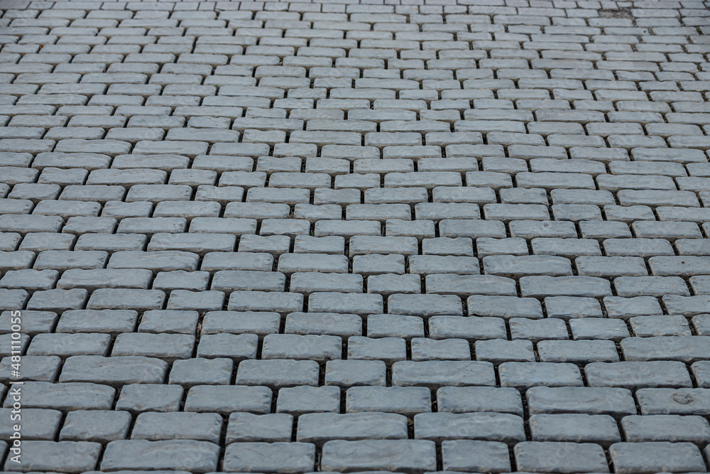 Cobble Stone Road In Lines Grey Background close-up