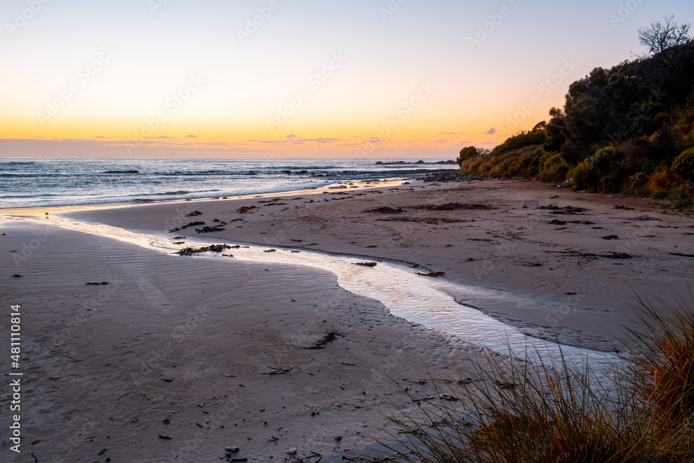 Scenic sunset over ocean beach in Australia