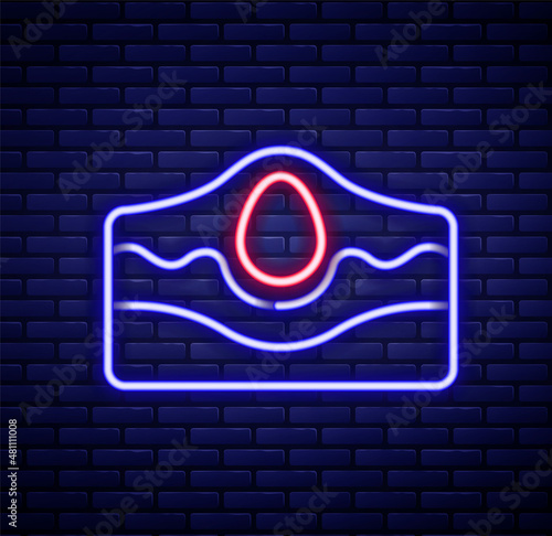 Glowing neon line Acne icon isolated on brick wall background. Inflamed pimple on the skin. The sebum in the clogged pore promotes the growth of a bacteria. Colorful outline concept. Vector
