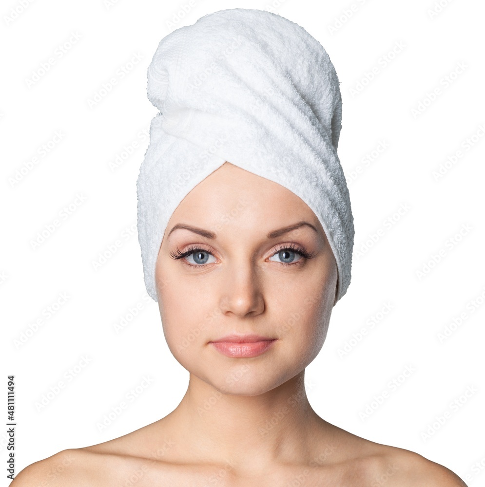 Young beautiful woman with a towel on her head Young beautiful woman with a towel on her head