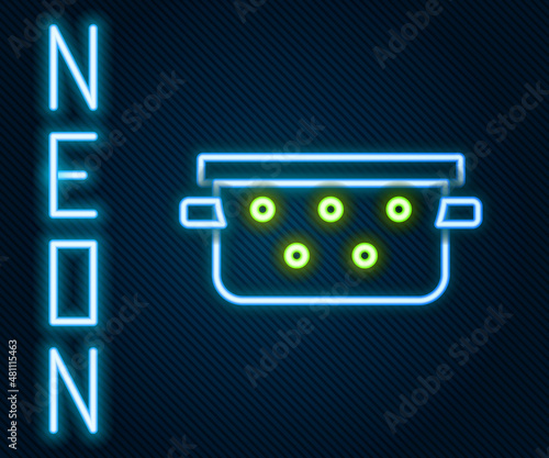 Glowing neon line Kitchen colander icon isolated on black background. Cooking utensil. Cutlery sign. Colorful outline concept. Vector