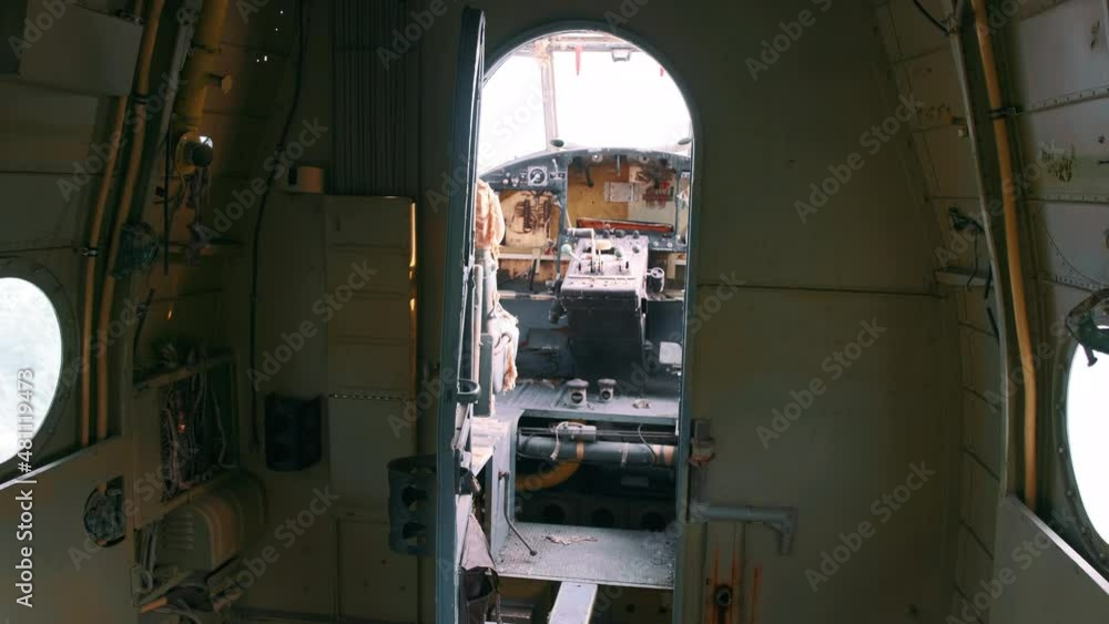 The cabin of the old Soviet aircraft AN-2, Antonov-2, the view from the passenger compartment on the cockpit. The cabin of the old Soviet aircraft AN-2, Antonov-2, the view from the passenger compartment on the cockpit.