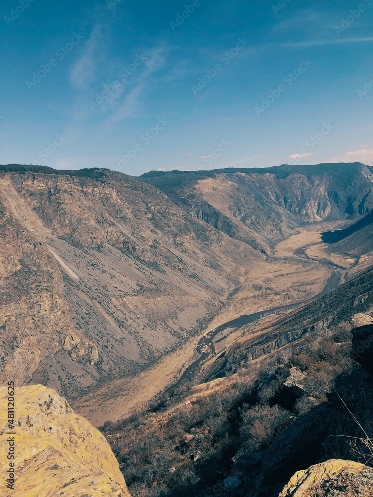 Katu Yaryk Pass in spring Chulyshman River valley. steep and dangerous serpentine to the river valley. View from the height