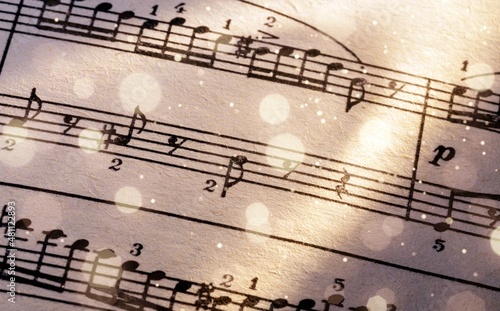 Wallpaper Mural Old sheet with Christmas music notes as background bokeh Torontodigital.ca