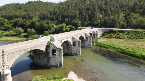 Aerial view of Nineteenth-century bridge over the Yantra River, known as the Kolyu Ficheto Bridge in Byala, Ruse region, Bulgaria photo