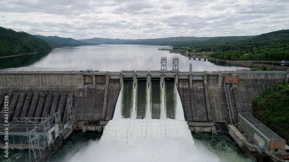 Aerial view of water discharge at hydroelectric power plant Aerial view of water discharge at hydroelectric power plant