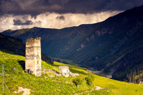 Ruins of a stone tower in the alpine village of Adishi. Georgia, Caucasus mountains. photo