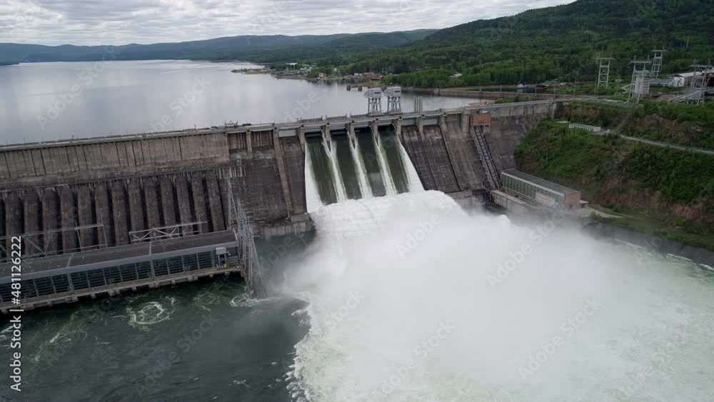 Aerial view of water discharge at hydroelectric power plant Aerial view of water discharge at hydroelectric power plant