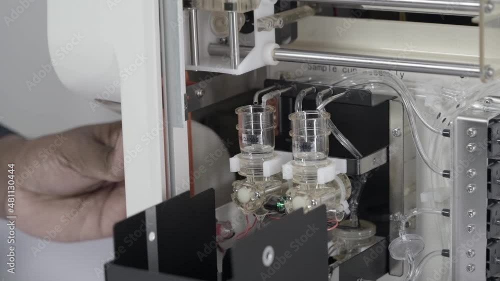 Close Up Of Electrode And Tubings Inside An Automatic Electrolyte Analyzing Machine. Close Up Of Electrode And Tubings Inside An Automatic Electrolyte Analyzing Machine.