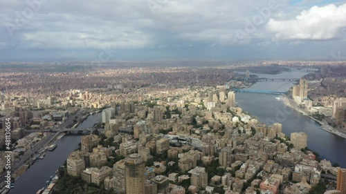  Aerial Zoom out reveal of downtown Zamalek Cairo and Parks in the city photo