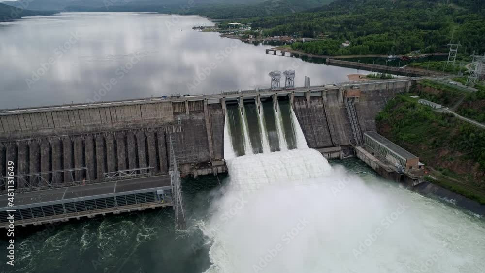 Aerial view of water discharge at hydroelectric power plant Aerial view of water discharge at hydroelectric power plant