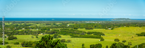 Scenic view towards the coast line with Byron Bay lighthouse in the background, Fotobehang