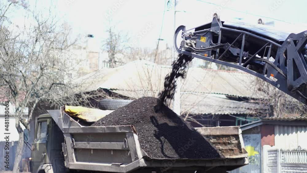 4k stock video footage of process of repairing of asphalt pavement of ...