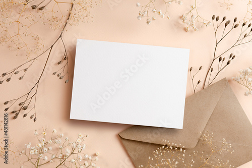 Greeting or invitation card mockup with envelope and dry natural plants twigs