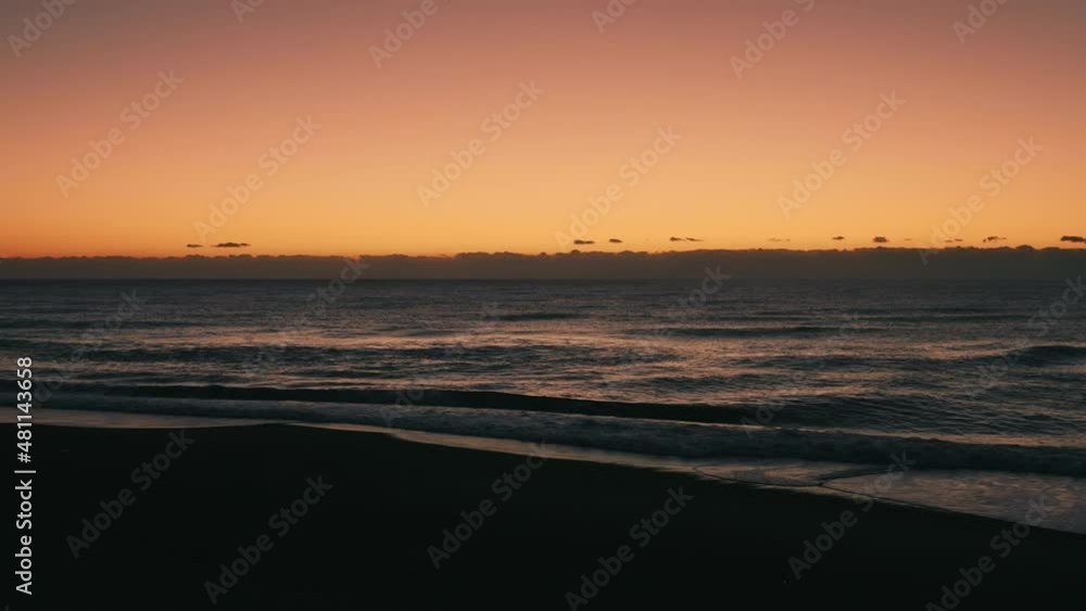 Windy waves of ocean at sunrise in the morning Windy waves of ocean at sunrise in the morning