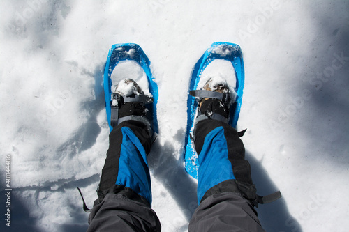Snowshoes on snow close up. 