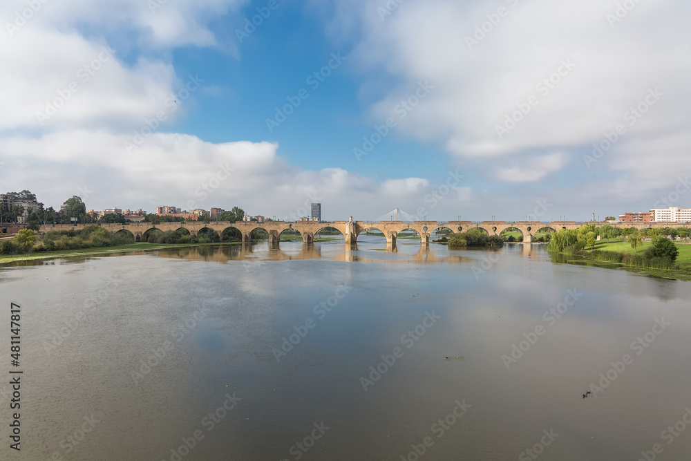 Amazing morning view at the Guadiana river and Palmas bridge, Guadiana Park  river on banks, Badajoz downtown city, Spain Stock Photo | Adobe Stock
