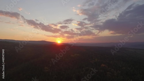 ProRes. Lake Baikal. Olkhon Island. Sunset over the forest. Khuzhir village. Summer shooting from a drone.