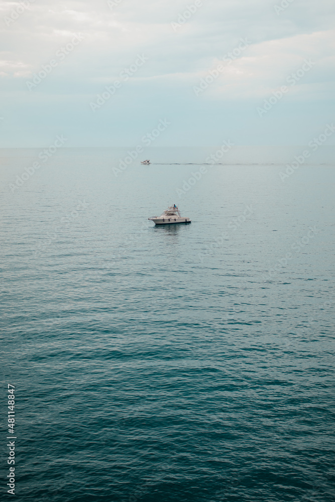 Naklejka premium Boat in Polignano a Mare, Italy