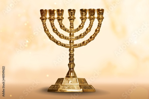 Hanukkah candlestick. Ancient ritual candle menorah festive attribute. Ritual item. photo