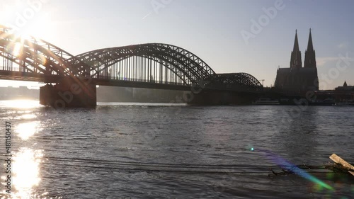 the rhine river with the dom church and hohenzollern brdige cologne germany photo