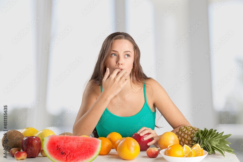 Happy young attractive woman who eats food Happy young attractive woman who eats food