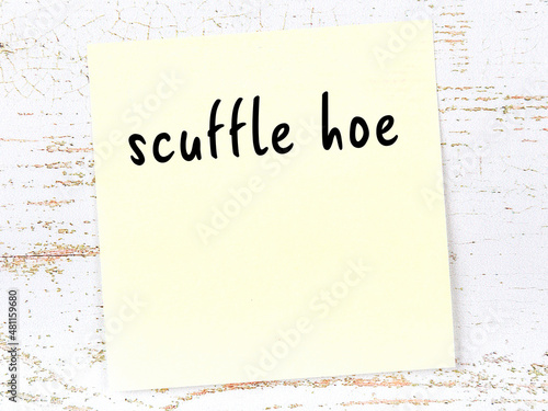 Fotografia Yellow sheet of paper with word scuffle hoe. Reminder concept