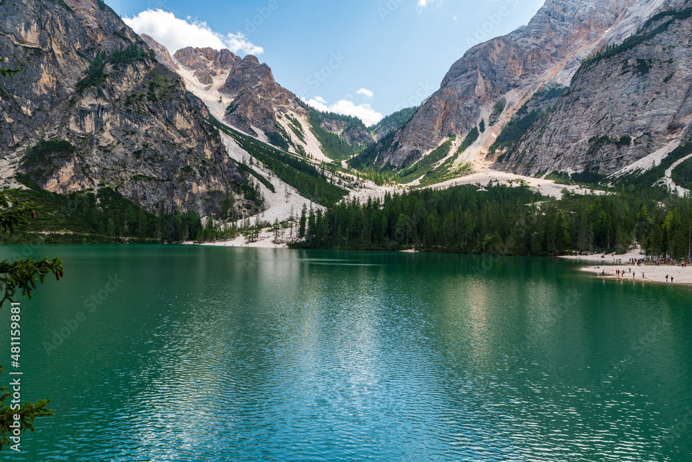 Pragser Wildsee lake with peaks on the background in the Dolomites