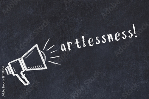 Chalk loudspeaker and inscription artlessness on black chalkboard
