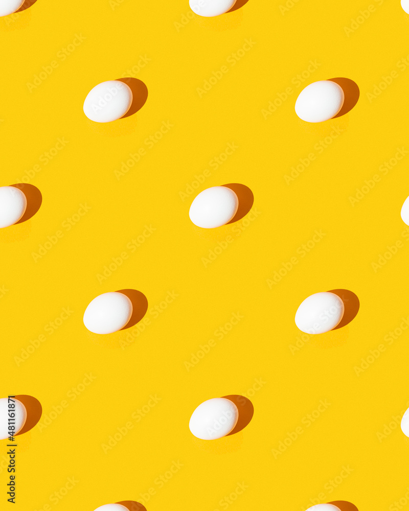 Pattern. Eggs on a yellow background Pattern. Eggs on a yellow background
