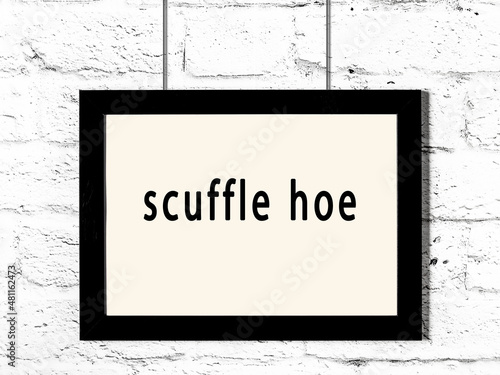 Принти на полотні Black frame hanging on white brick wall with inscription scuffle hoe
