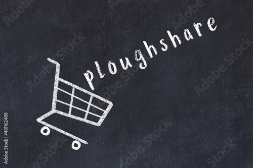 Chalk drawing of shopping cart and word ploughshare on black chalboard. Concept of globalization and mass consuming photo