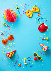 Colorful party items for carnival or birthday party on blue background