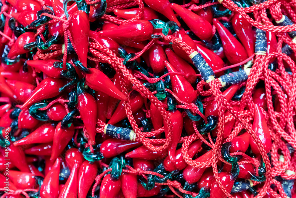 Fototapeta premium Superstitious objects typical of Naples, Italy. Composed of typical Neapolitan horns, for sale in the stalls of San Gregorio Armeno
