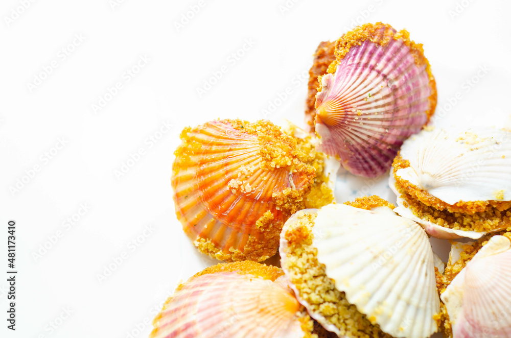 Mini coquilles St. Jacques, Natural scallop shells filled with Patagonian scallops and Thermidor sauce topped with a ciabatta breadcrumb topping Mini coquilles St. Jacques, Natural scallop shells filled with Patagonian scallops and Thermidor sauce topped with a ciabatta breadcrumb topping