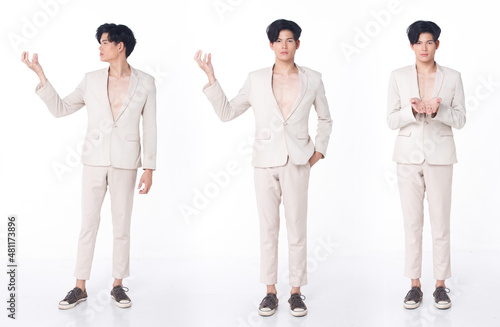 Full length Portrait 20s Asian Business man wear cream Formal Suit pants shoes for Gala Dinner