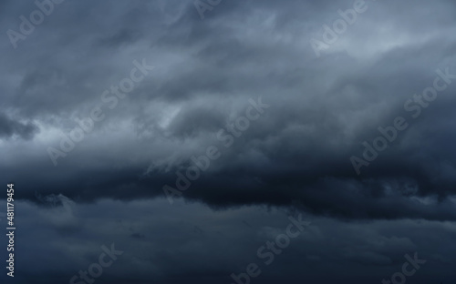 beautiful dark dramatic sky with stormy clouds before the rain or snow