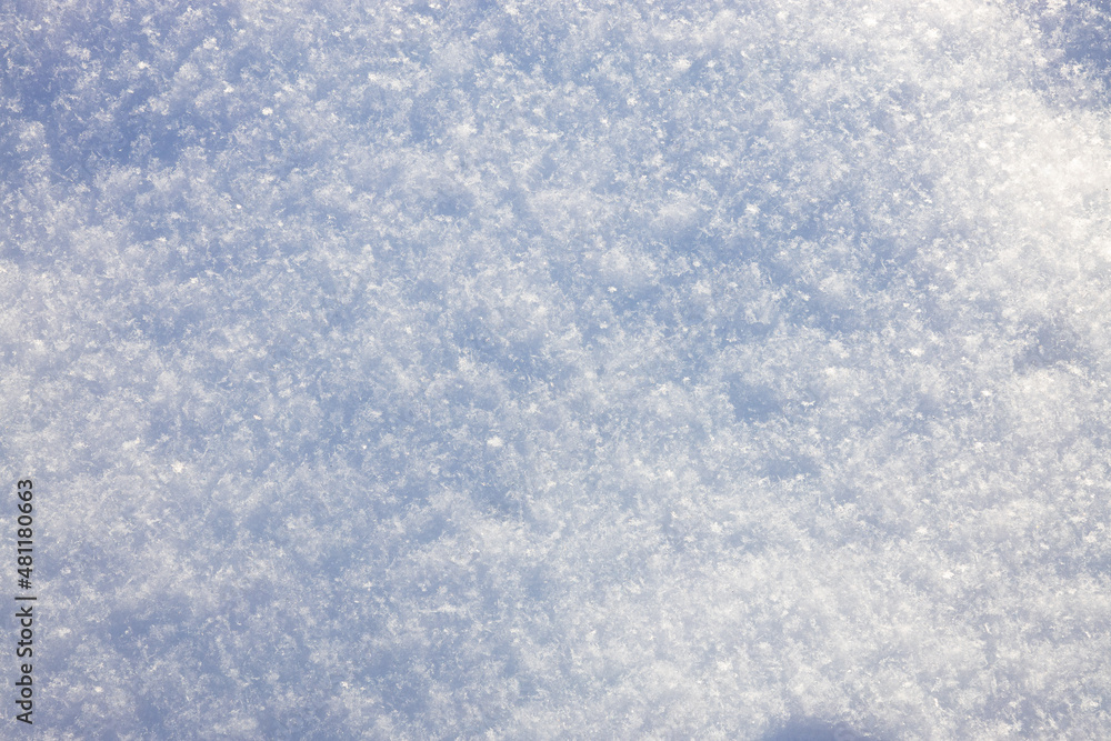 Close up macro shot of beautiful stunning glowing snow and snowflakes. Snow design abstract pattern. High quality photo