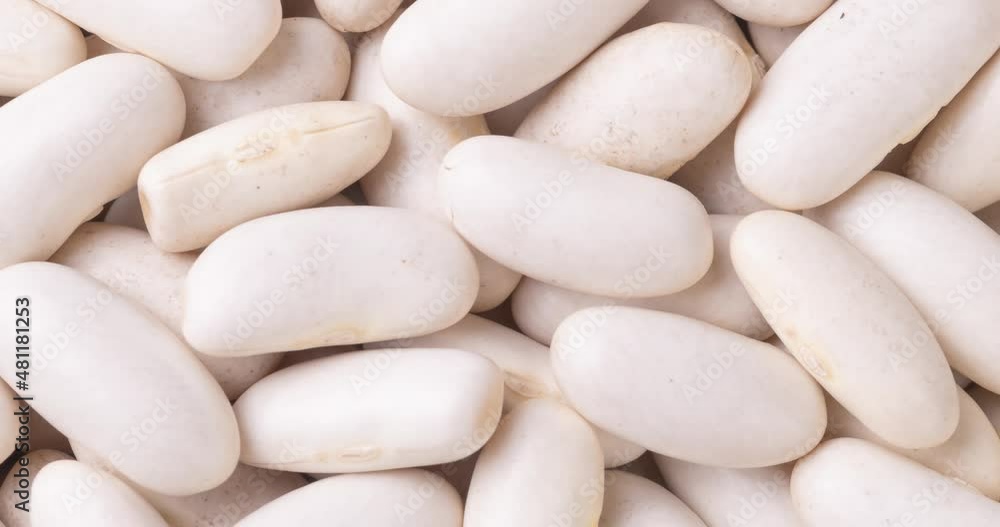 Top view, closeup of white beans. Food backdrop Top view, closeup of white beans. Food backdrop
