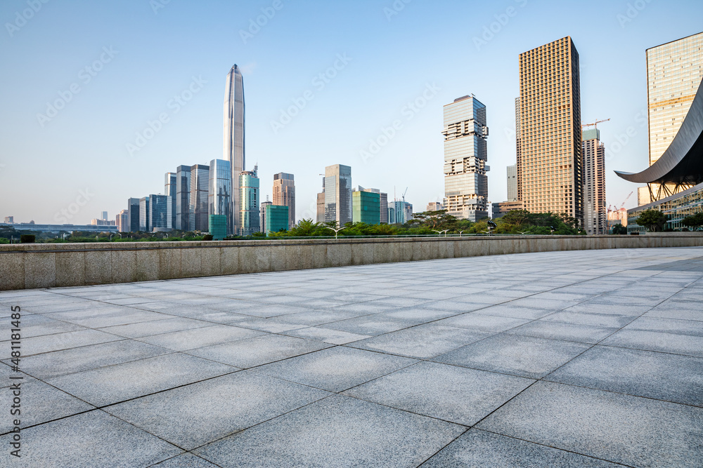 Empty square floor and city skyline with modern commercial office buildings in Shenzhen, China.