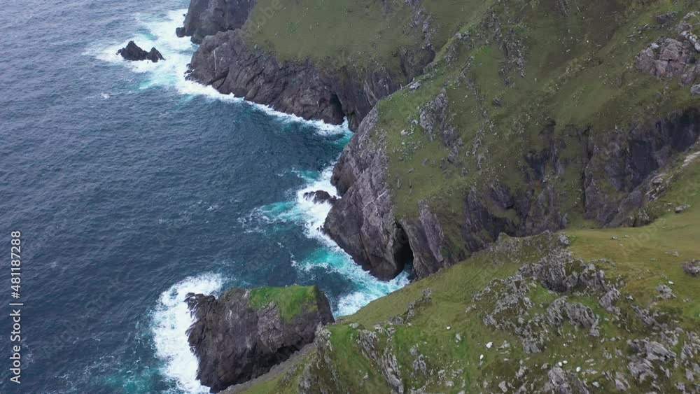 Cinematic drone shot of the rocky mountain coastline near Keem Beach, Ireland Cinematic drone shot of the rocky mountain coastline near Keem Beach, Ireland