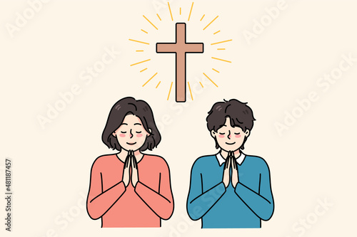 Little religious kids near cross in church pray to God feel superstitious. Small children believers with prayer hands show faith and religion. Superstition and high power. Vector illustration. 