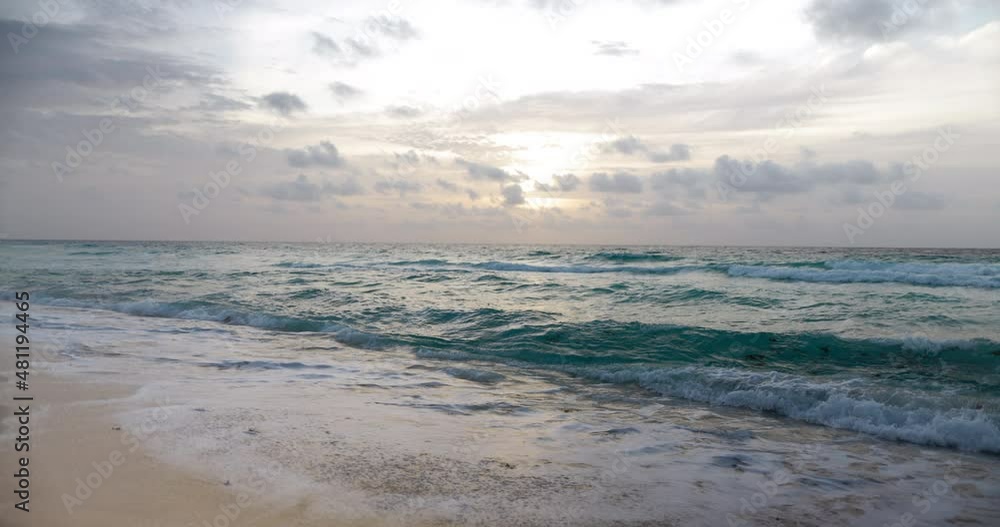 Astonishing view of beautiful sky above ocean waves on the beach Astonishing view of beautiful sky above ocean waves on the beach