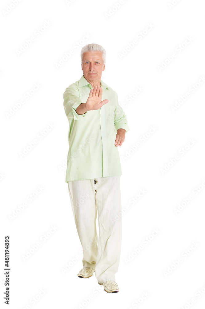 portrait of senior man showing stop gesture on white background portrait of senior man showing stop gesture on white background