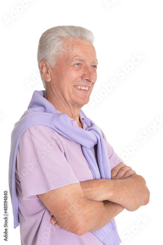Portrait of senior man posing on white background