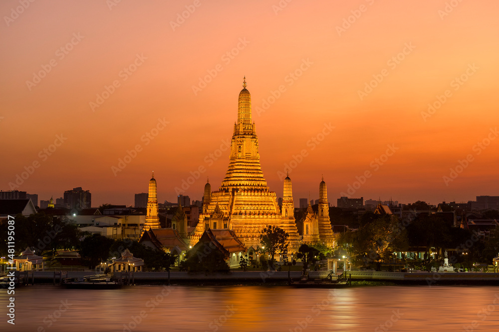 Beautiful view of Wat Arun Temple at sunset in Bangkok, Thailand.