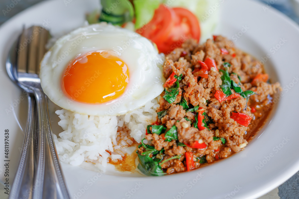 Thai Food Stir Fried Pork with Basil Leaves Popular food in Thailand. Thai Food Stir Fried Pork with Basil Leaves Popular food in Thailand.